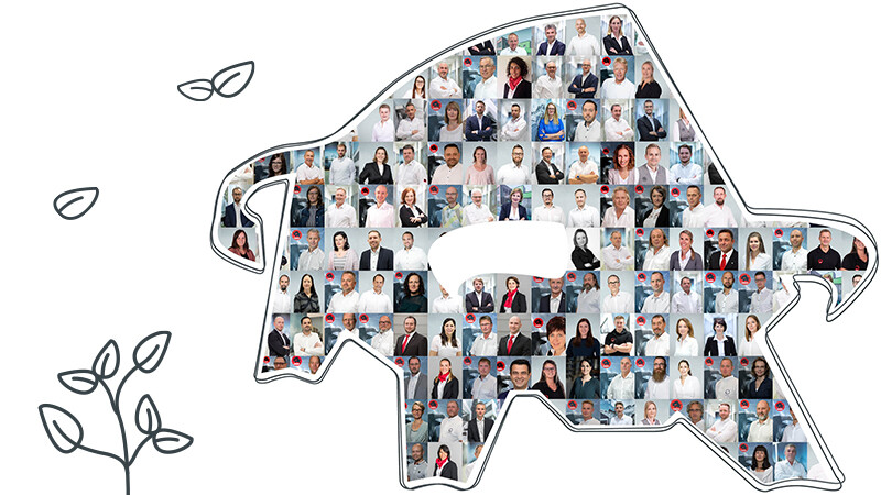 PREFA logo s býkom vyplnené portrétmi zamestnancov – symbolizuje hodnoty a ciele spoločnosti PREFA Aluminiumprodukte GmbH