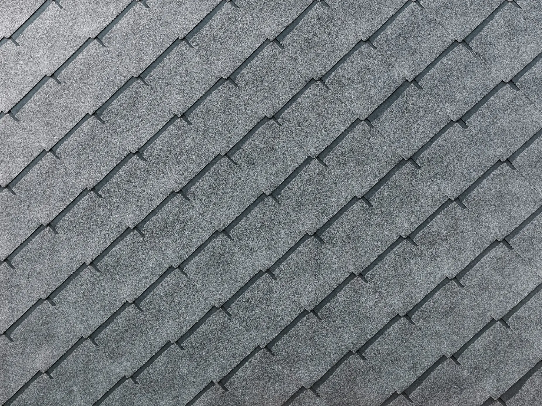 Detailná snímka PREFA hliníkových fasádnych šablón 44 × 44 vo farbe P.10 kamenná šedá