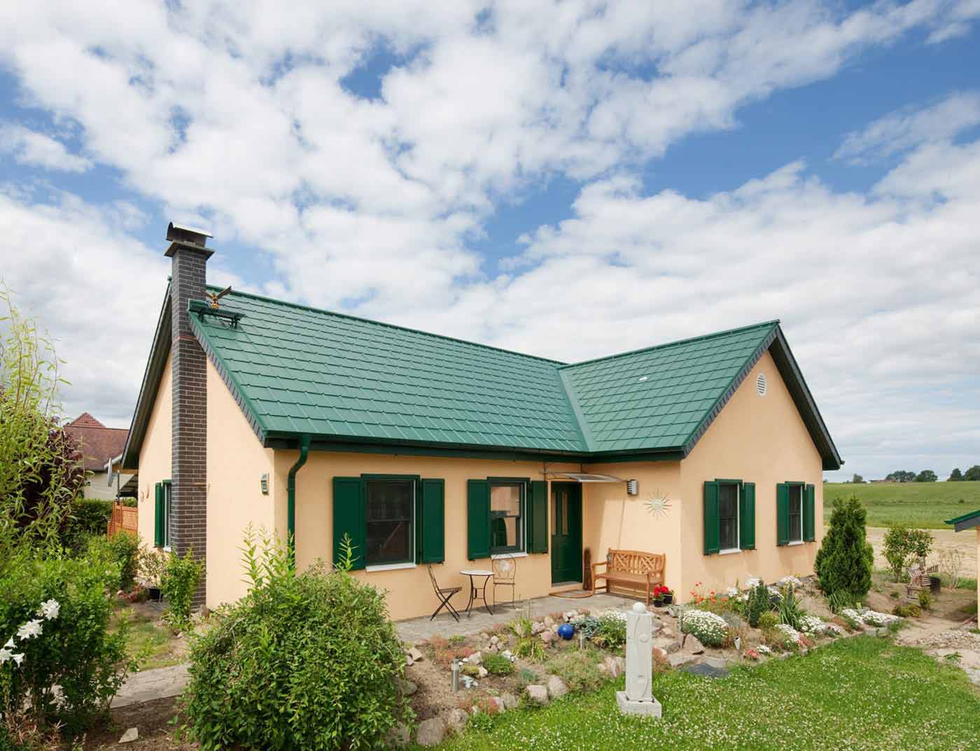 Referenčné objekty PREFA Strešné systémy Falcovaná škridla 06 P.10 machovozelená